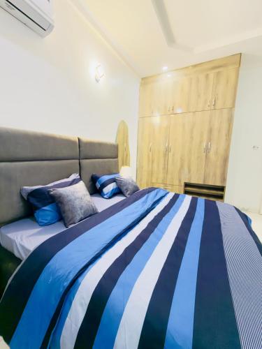 Ένα ή περισσότερα κρεβάτια σε δωμάτιο στο Merakie Homes