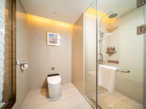 Vannituba majutusasutuses Vienna International Hotel