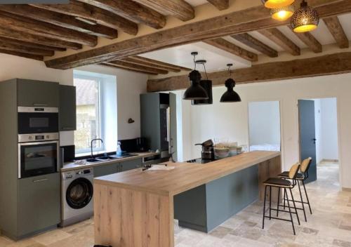 Kuchyň nebo kuchyňský kout v ubytování Gîte de Blavette