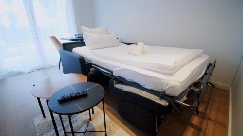 Postel nebo postele na pokoji v ubytování YUVA HOMES -2 Zimmer-S-Bahn MUC-grosser Balkon-Parkplatz