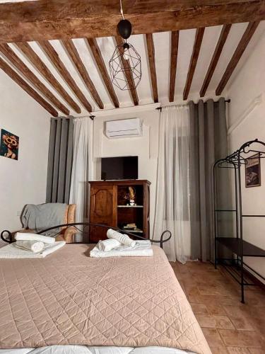 a bedroom with two beds in a room at B&B Note di Verdi in Parma