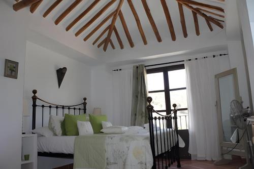 Postel nebo postele na pokoji v ubytování Casa Cruz Resort