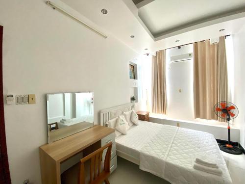 Postel nebo postele na pokoji v ubytování Homestay Cô Gái Việt