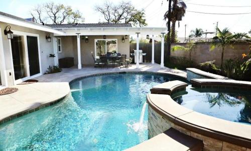 a swimming pool in the backyard of a house at Destination #29 in Anaheim