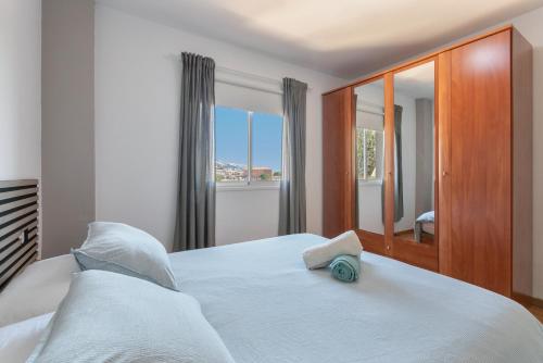 Ένα ή περισσότερα κρεβάτια σε δωμάτιο στο Brisas del mar eddy, air, wifi