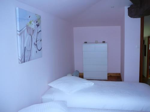 Postel nebo postele na pokoji v ubytování Gite Les Hauts De L'estuaire