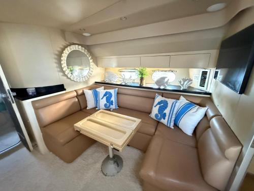 a small living room with a couch and a table at punta excursiones the king of kings in Punta Cana