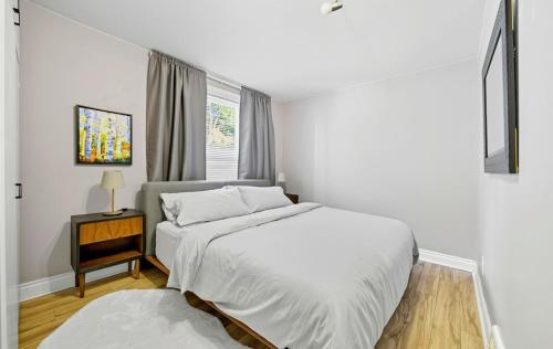 Postel nebo postele na pokoji v ubytování Cumberland Cottage