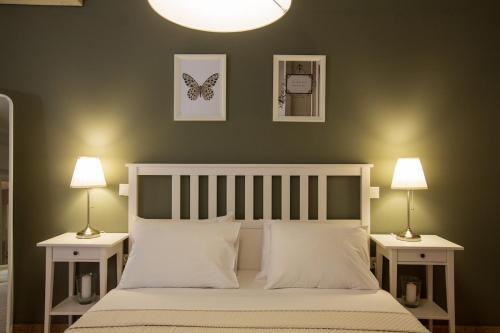 Giường trong phòng chung tại Antigonis Athenian Home