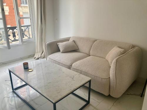 Posezení v ubytování Comfortable studio Place des Vosges - Marais