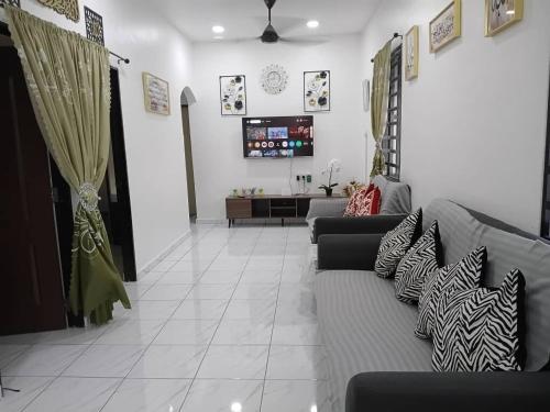 Posezení v ubytování Balqis LN Homestay