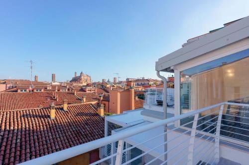 a balcony with a view of the city at The Rooftop in Bologna