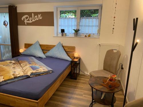 Ένα ή περισσότερα κρεβάτια σε δωμάτιο στο Ferienwohnung-Wieber