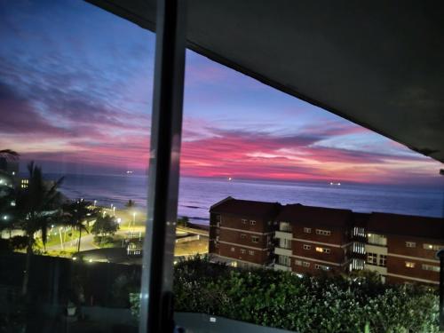 a view of the ocean from a hotel window at The Beach Nook - Umdloti Holiday Resort in Umdloti