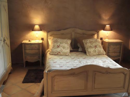 Ένα ή περισσότερα κρεβάτια σε δωμάτιο στο Le Chêne