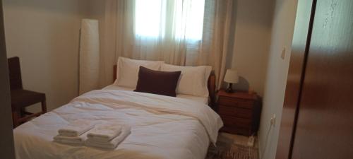 Postel nebo postele na pokoji v ubytování House by the Mountain