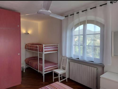 Postel nebo postele na pokoji v ubytování L'Appartamentino Di Giulia