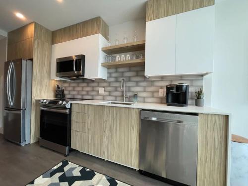 Kuchyň nebo kuchyňský kout v ubytování Bright 1 BR with patio and 6 app