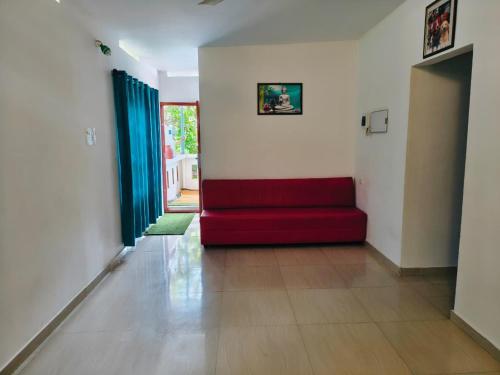 Posezení v ubytování Poppy Stays Varkala