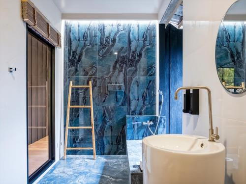 Ένα μπάνιο στο The Arch Casa - Design Hotel Pai