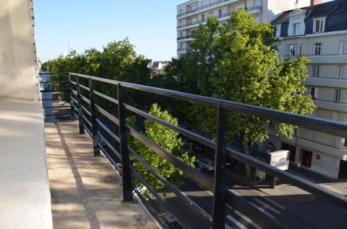 Balkón nebo terasa v ubytování HYPER CENTRE TOURS avec Parking