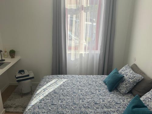 Ένα ή περισσότερα κρεβάτια σε δωμάτιο στο CreaConfort Casa Boa Jóia de Campanhã