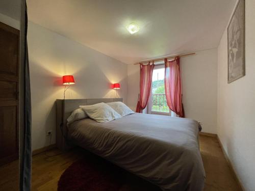 Una cama o camas en una habitación de Choko-ona