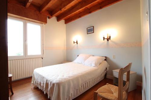 Ένα ή περισσότερα κρεβάτια σε δωμάτιο στο Ongui ethorri