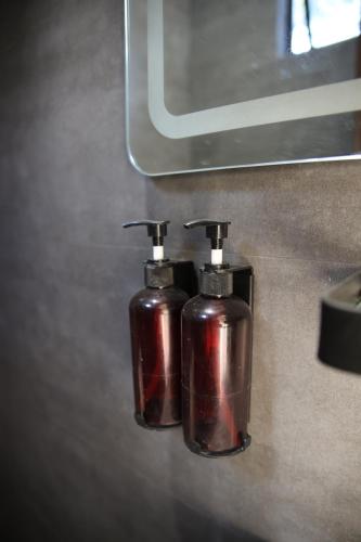 two fire hydrants are sitting on a counter at Locale District Boutique Hotel in Quezon