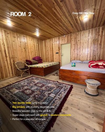 a room with two beds and a chair in it at Offbeat Jn in Sukhia Pokhari