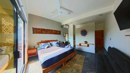 Ένα ή περισσότερα κρεβάτια σε δωμάτιο στο Houzze Plety