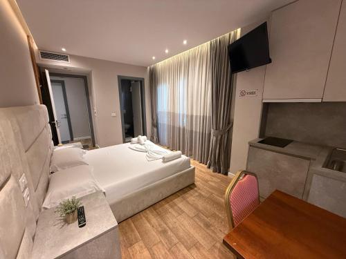 Postel nebo postele na pokoji v ubytování La Villa Bnb
