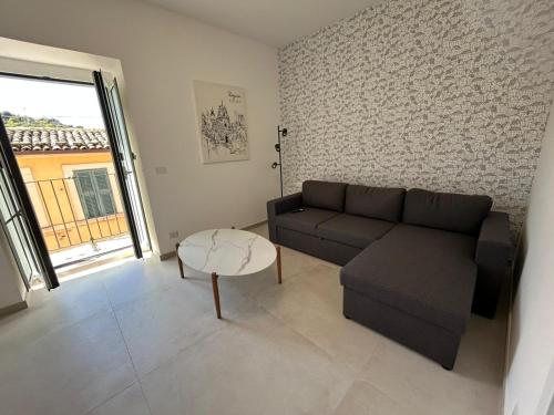 Posezení v ubytování Riflessi su Ibla