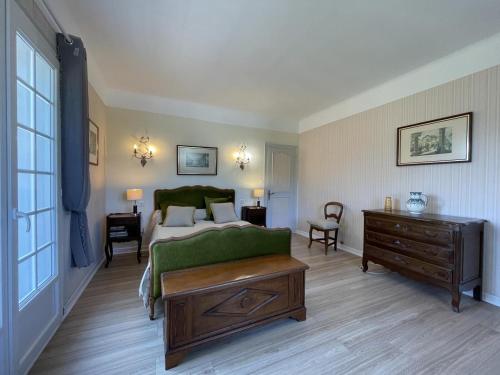 Ένα ή περισσότερα κρεβάτια σε δωμάτιο στο Ateka