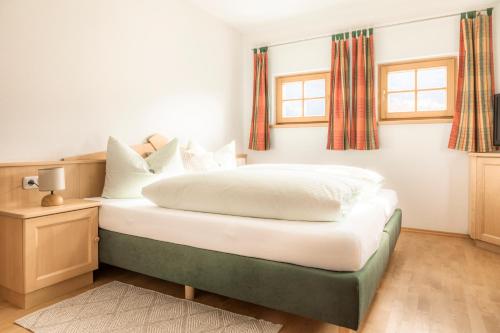 Ένα ή περισσότερα κρεβάτια σε δωμάτιο στο Viehhofgut