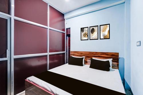 Ένα ή περισσότερα κρεβάτια σε δωμάτιο στο SPOT ON Yatri Nivas Hotel