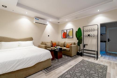 Ένα ή περισσότερα κρεβάτια σε δωμάτιο στο Quiet studio in Olaya with self check-in 219