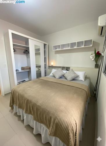 a bedroom with a large bed in a room at Casa privada 3 quartos ótima localização in Piranhas