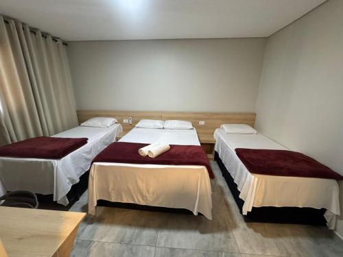 Postel nebo postele na pokoji v ubytování Hotel Novo México