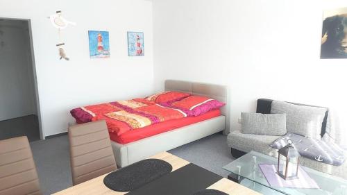 En eller flere senge i et værelse på Soleil et me