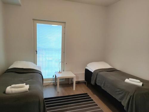 Postel nebo postele na pokoji v ubytování Central and Spacious Apartment for 6 with Sauna