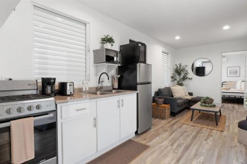 Kuchyň nebo kuchyňský kout v ubytování Los Vagones del Rio - Riverfront