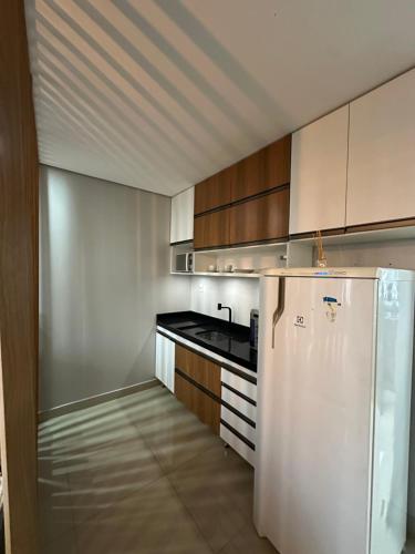 Kuchyň nebo kuchyňský kout v ubytování Flat Alto Padrão em Adrianopolis