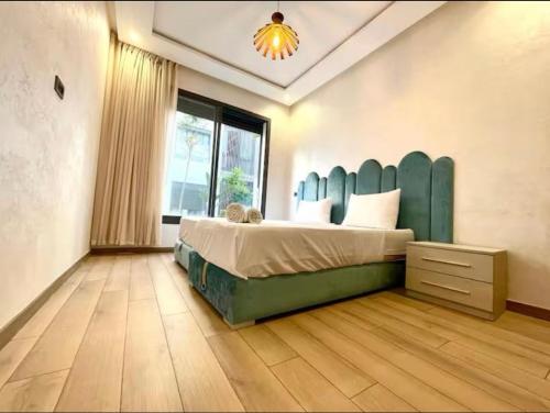 Ένα ή περισσότερα κρεβάτια σε δωμάτιο στο Marco