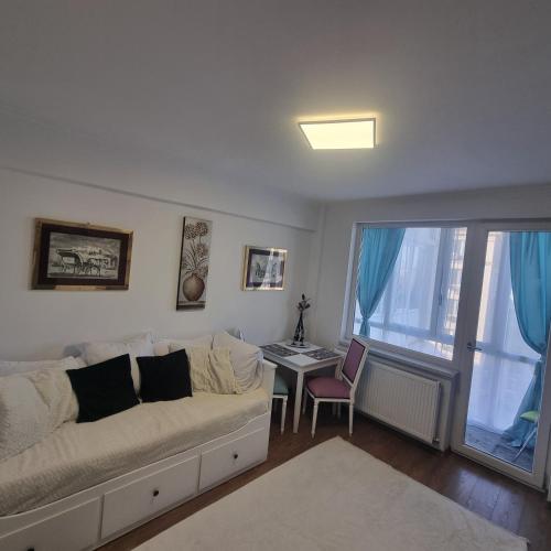 Khu vực ghế ngồi tại Apartament Flavia