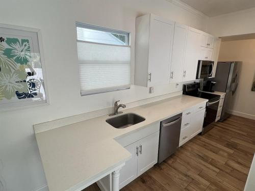 Kuchyň nebo kuchyňský kout v ubytování Island Paradise