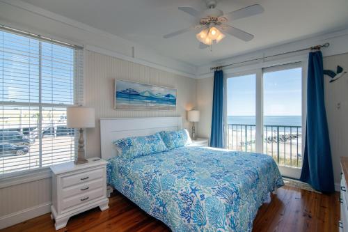 Postel nebo postele na pokoji v ubytování Moon Tide