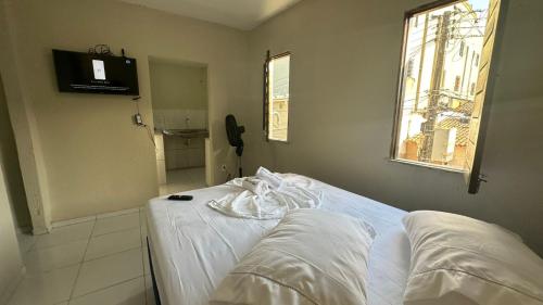 Postel nebo postele na pokoji v ubytování Garden Flat Beach