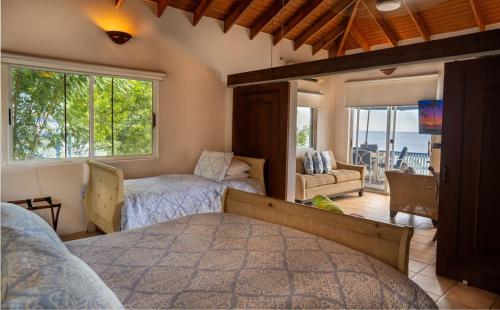 Postel nebo postele na pokoji v ubytování Le Sirenuse | Paradise Haven in Culebra, Island