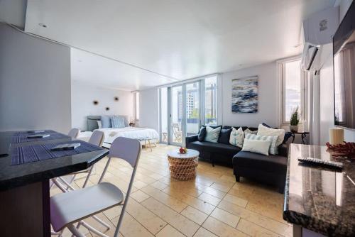 Posezení v ubytování ÁMARE | Cozy Beach Studio | Generator | Condado